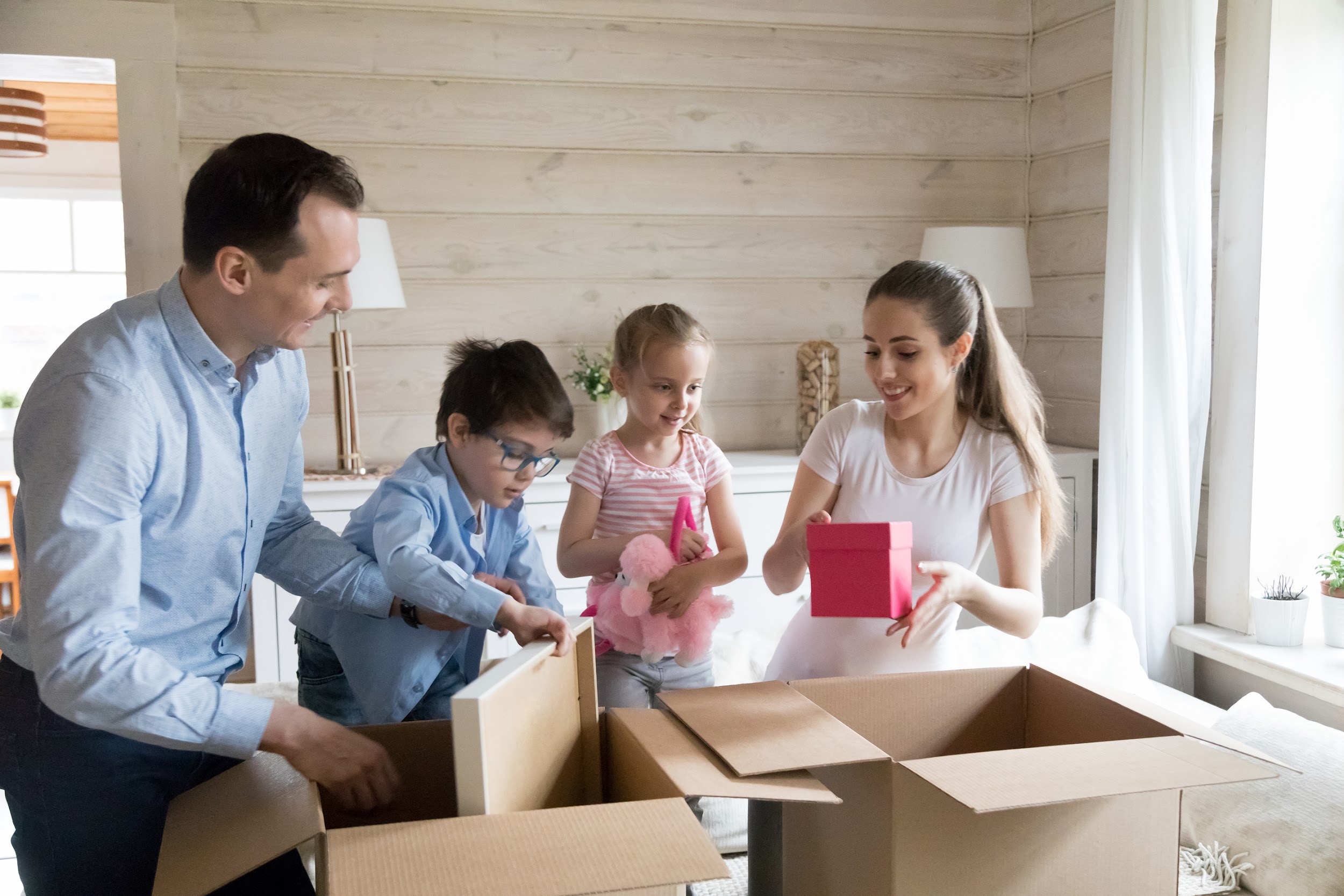 family opening gifts together